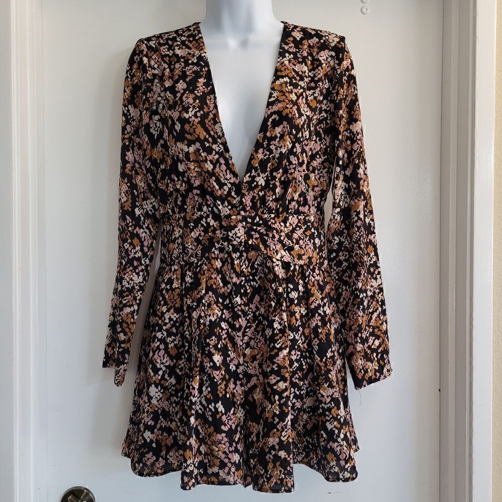 Roxberi Elle floral fall romantic romper with plunging neckline